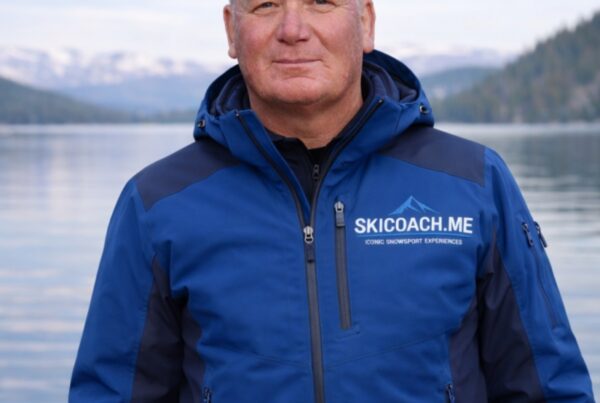A PSIA-certified SkiCoach.Me coach in a branded jacket